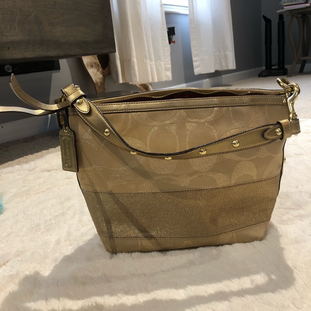 Gold coach purse